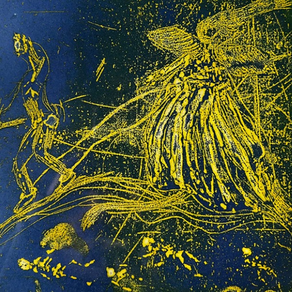 A painting of yellow paint on the ground.